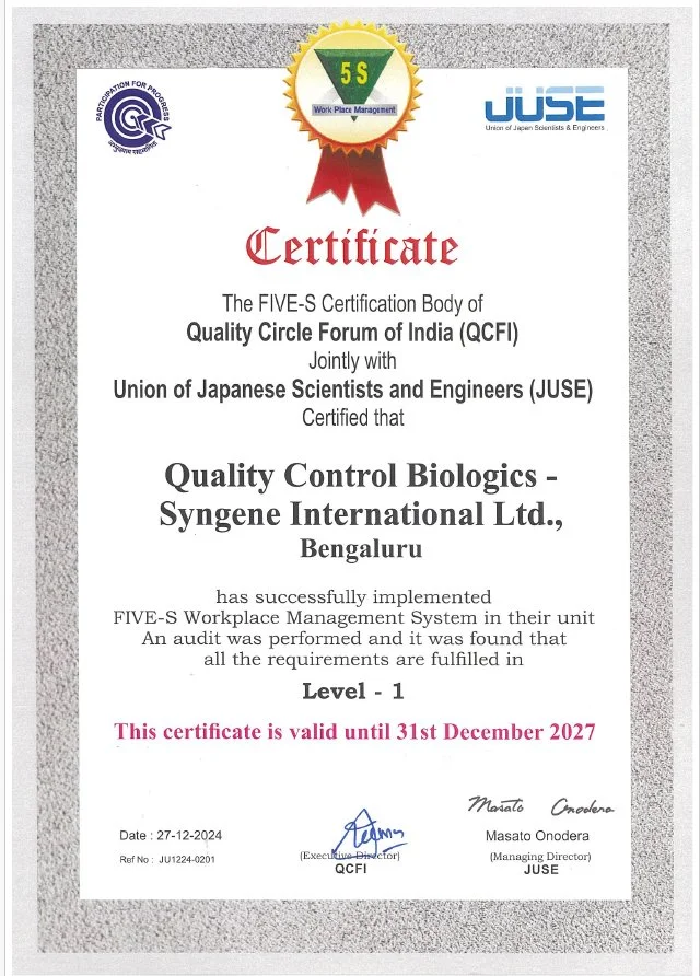 Two Women in Lab coats walking in a hallway